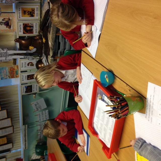 Children writing.JPG