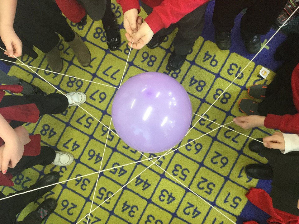 Kingfishers balancing the ballon.jpg